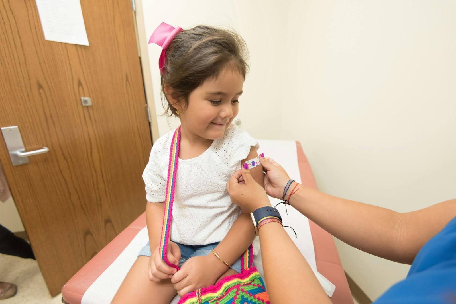 Little Girl Receiving a Flu Shot
