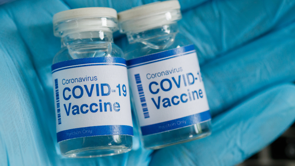 Two vials of COVID-19 vaccines.