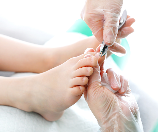 Toenails being cut