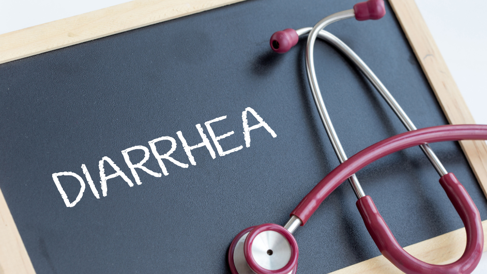 Small chalkboard with "Diarrhea" written and a stethoscope on top of the chalkboard