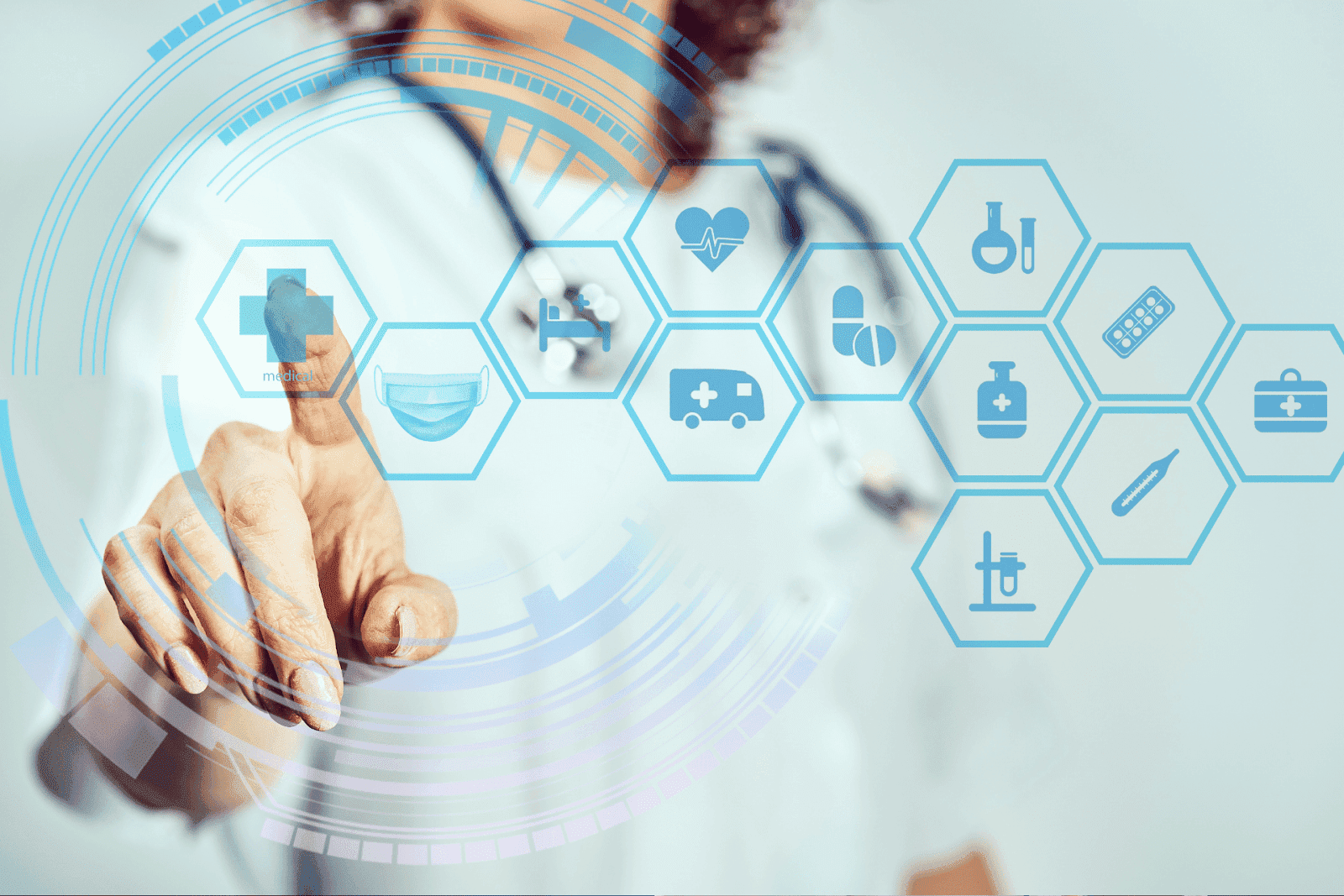 Doctor in a white coat using a futuristic digital touchscreen with medical icons.