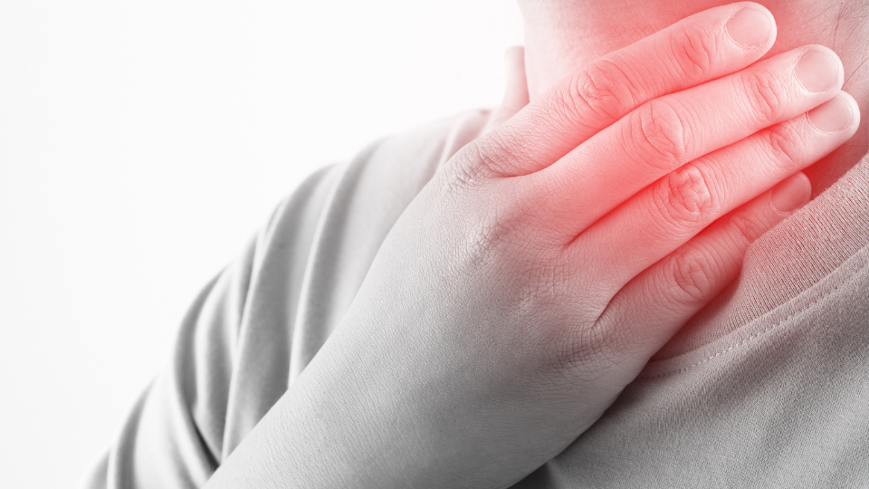 Person holding throat with image highlighting area of pain