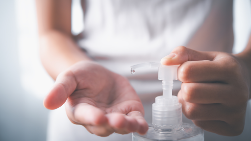 Person applying skincare product