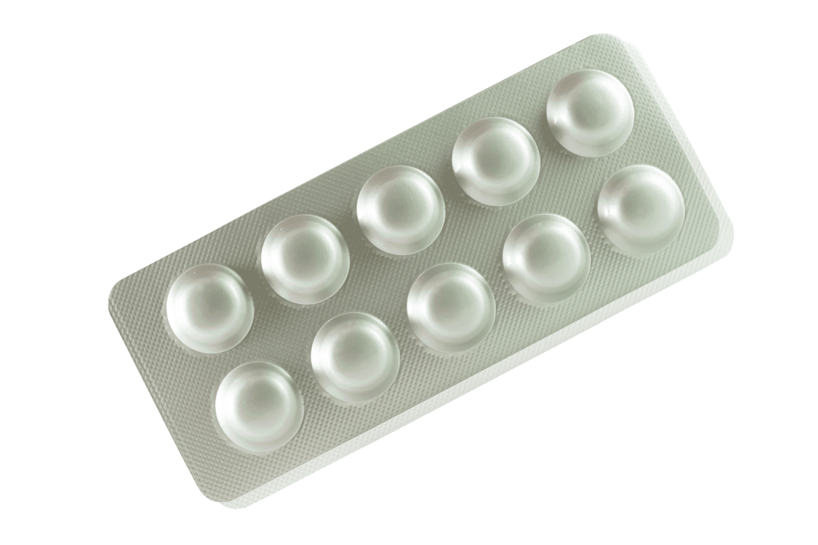 Blister pack containing round tablets on a white background