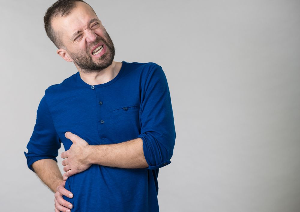 Man experiencing ribs pain