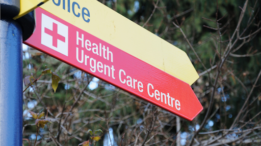 Directional sign pointing toward the Urgent Care Center