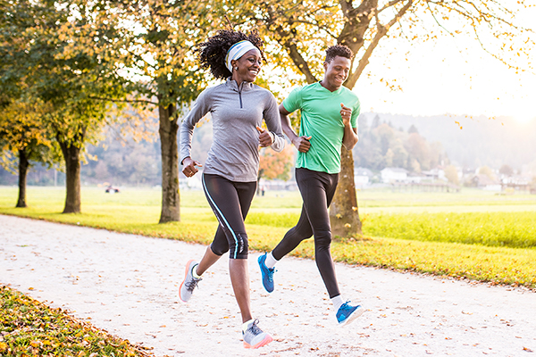 Two people engaging in a physical fitness activity