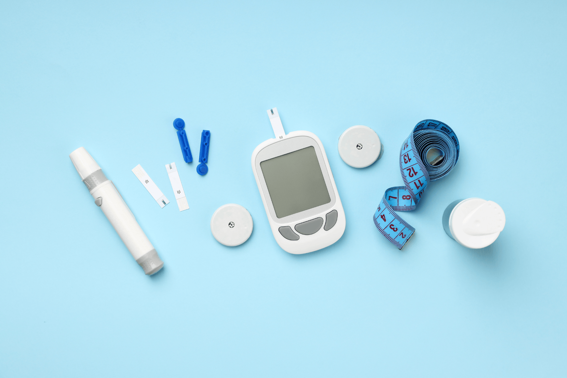Diabetes management tools laid out neatly, highlighting daily health monitoring and care.