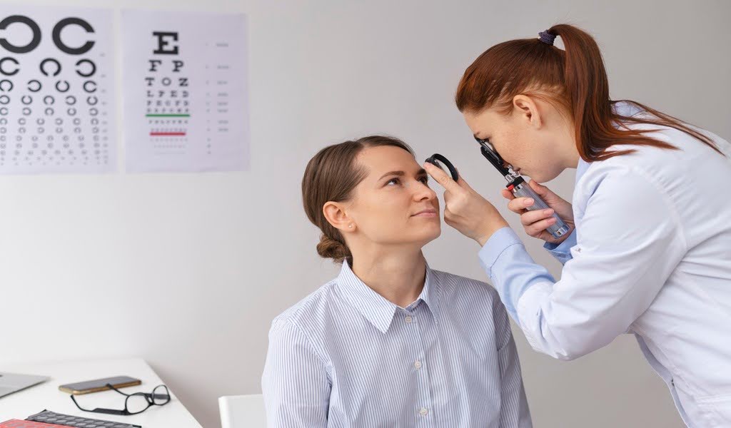Ophthalmologist carefully examining a patient's eye health