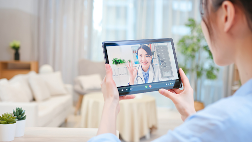 Person on video call with doctor