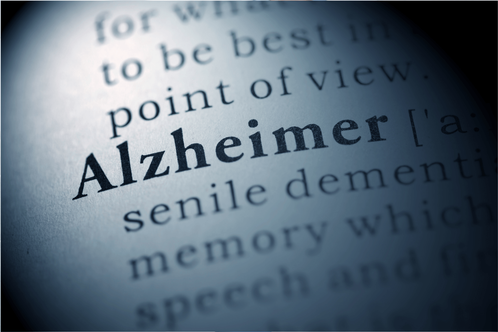 Close-up of the word ‘Alzheimer’ highlighted in a dictionary.