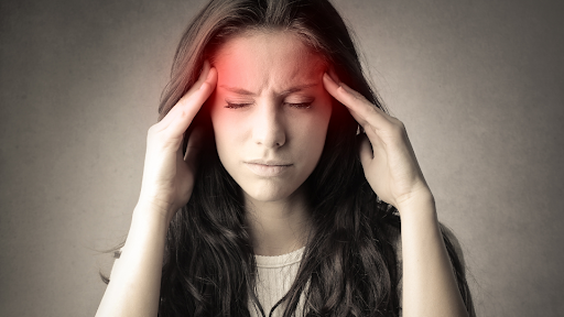 Woman suffering from a headache
